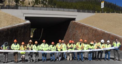 Eisenhower Johnson Memorial Tunnel Resurfacing Project Team cutting the