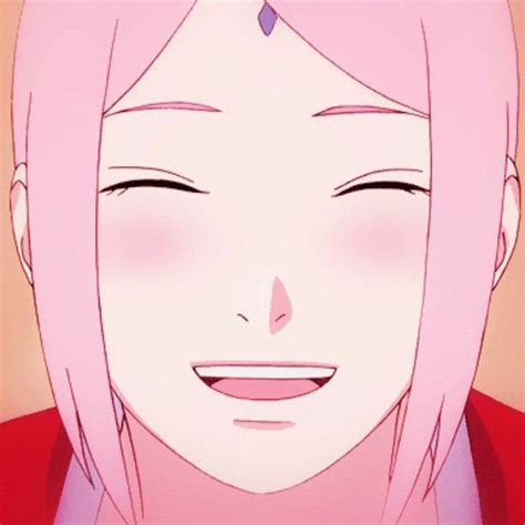 An Anime Girl With Pink Hair And Piercings On Her Forehead Smiles At