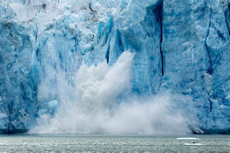 Iceberg Calving from Glacier, Alaska posters & prints by Corbis