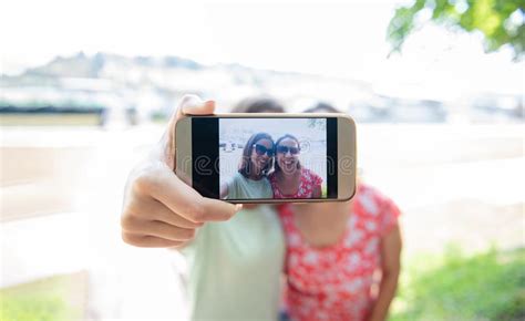 Girlfriends Taking Selfie Together Having Fun Outdoors Concept Of Modern Women Friendship