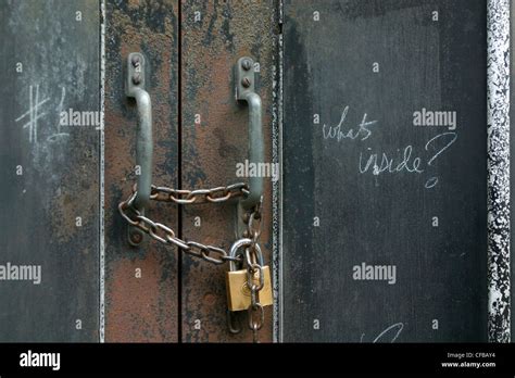 Locked door on London warehouse Stock Photo - Alamy