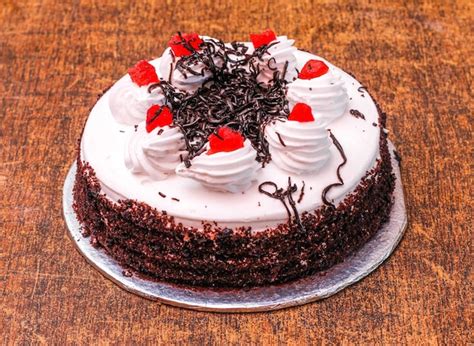 Premium Photo Delicious Black Forest Cake Decorated With Whipped