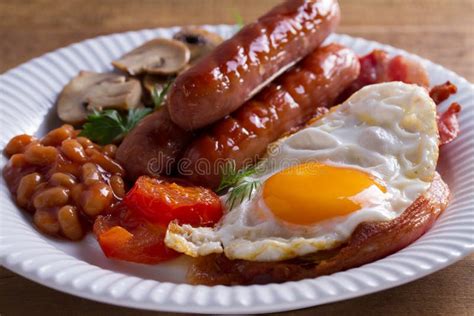 Full English Or Irish Breakfast Sausages Bacon Egg Mushrooms