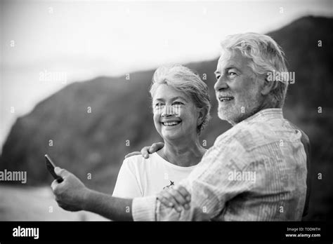 Beautiful Romantic Portrait Of Senior Happy Couple Smile And Hug