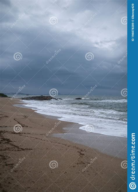 The beach at sunset clouds stock image. Image of outdoor - 196078289