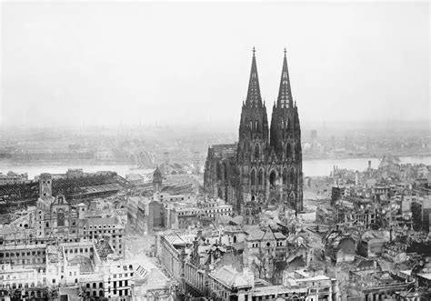 The Cologne Cathedral Stands Tall Amidst The Ruins Of The City After