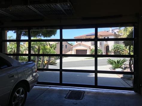 Ultra Modern Black Frameless Glass Garage Doors W Now Technology