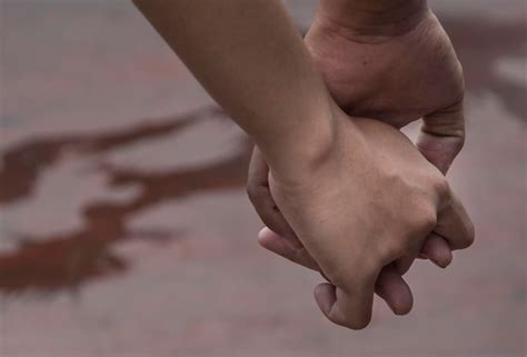 Premium Photo Cropped Image Of People Holding Hands