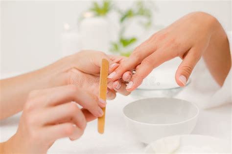 Beautician Filing Female Client S Nails At Spa Beauty Salon Stock Image