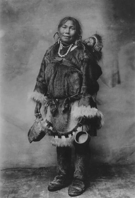 Alaska Photos-Eskimo mother with child on back Alaska historic photo