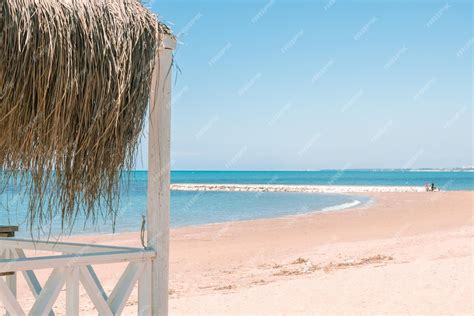 Premium Photo Massage Huts With Thatched Roof On Sand Beach Along