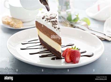 Three Chocolate Layered Mousse Cake Stock Photo Alamy