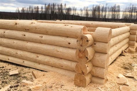 Drying And Assembly Of Wooden Log House At A Construction Base Stock