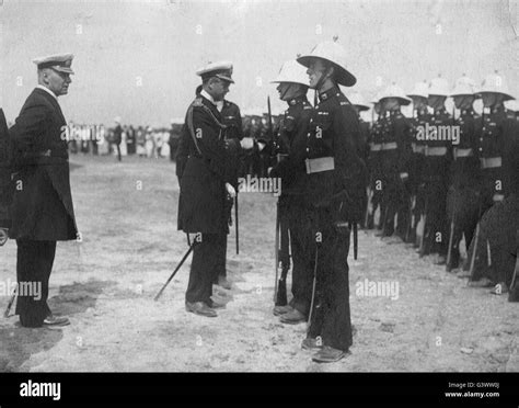 Royal Navy Officers And Royal Marines Inspected By Royalty Stock Photo