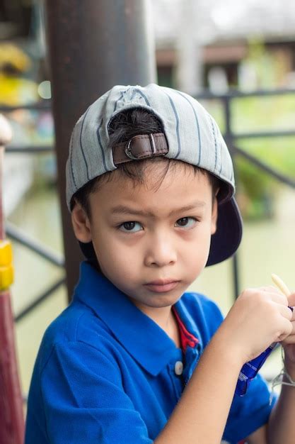 Premium Photo Portrait Of Boy Wearing Cap