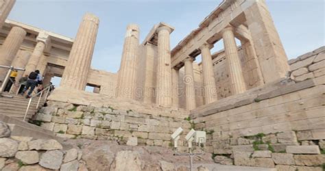 Acropolis Of Athens Entrance Gate Pillars With Tourists Stock Footage