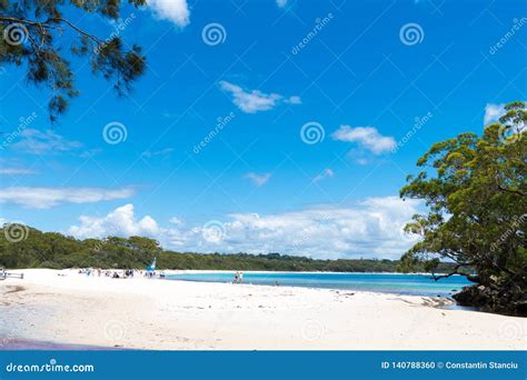 People Enjoying The Sunny Weather At Galamban Green Patch Beach In