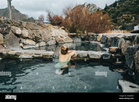 Portrait Of Woman In Natural Hot Springs Relaxing Stock Photo Alamy