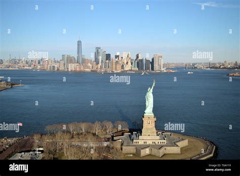 Aerial view of Liberty Island with Statue of Liberty and Manhattan ...