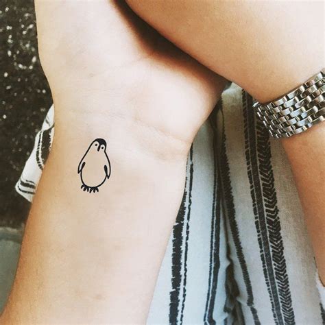 Details more than 81 minimalist small penguin tattoo - in.cdgdbentre