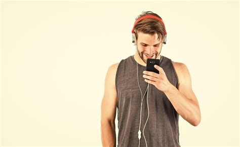 Premium Photo Audio Track Man Handsome Unshaven Hipster Listening Audio File Using Headphones