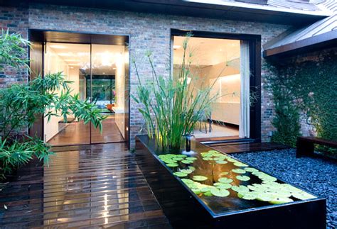 Raised pond in a modern yard - Decoist