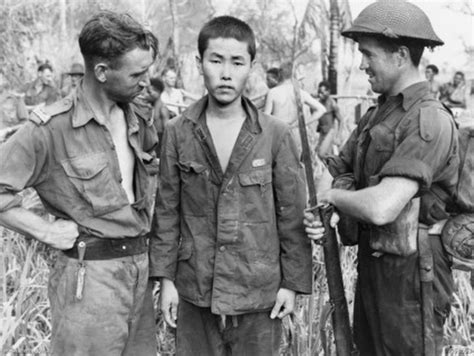 Two Australian Army Soldiers With A Japanese Prisoner Of War At Dumpu