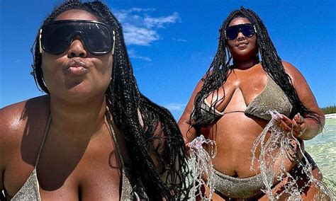 Lizzo Showcases Her Figure In A Gold Bikini As She Frolics On The Beach