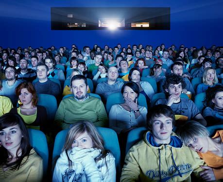 Scared Audience In Movie Theater Stock Photo - Download Image Now ...