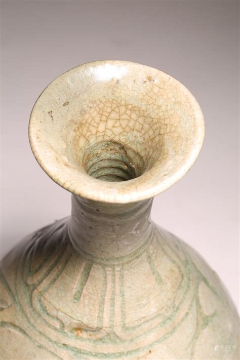 Bidlive A Chinese Celadon Glazed Yuhuchun Vase