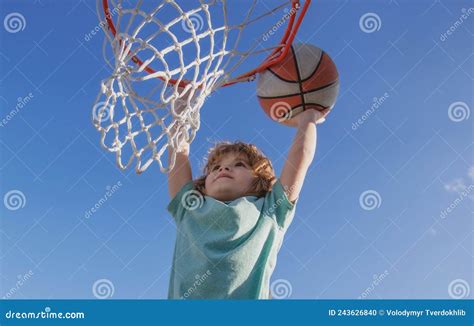 Basketball Slam Dunks Of Sporty Kids Basketball Player. Close Up Image ...