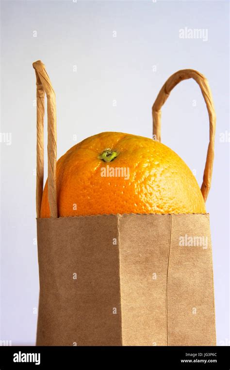 Orange In A Brown Paper Bag Stock Photo Alamy