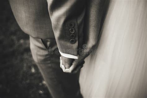 Black and White Photo of Wedding Couple. Closeup View of Hands Holding ...