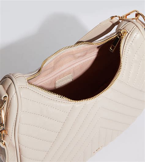 Buy Tyra Quilted Cross Body Bag With Coin Pouch In Beige Thstreet Uae