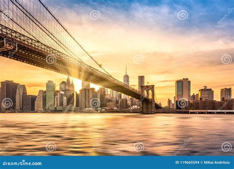 Sunset Over Brooklyn Bridge In New York City Stock Photo Image Of