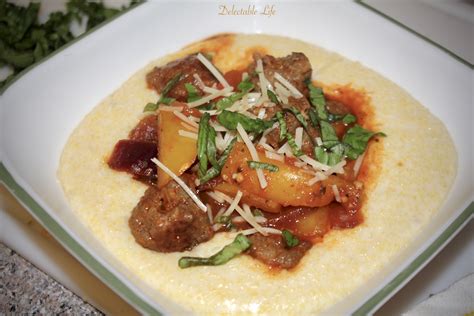 Sausage And Peppers Over Creamy Parmesan Polenta Recipe Allrecipes