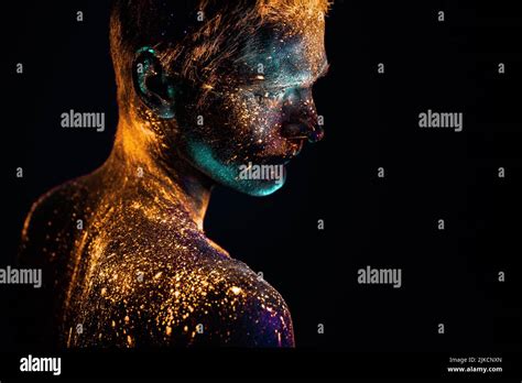 Portrait Of A Man Painted In Fluorescent UV Colors Stock Photo Alamy