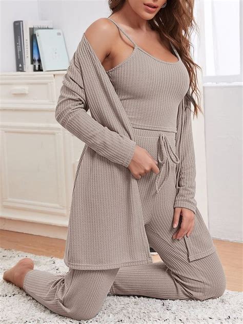 Youll Feel Casual In This Flirty Pajama Set Featuring A Camisole And Loose Pants Style