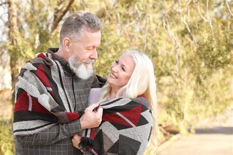 Premium Photo Happy Mature Couple In Autumn Park