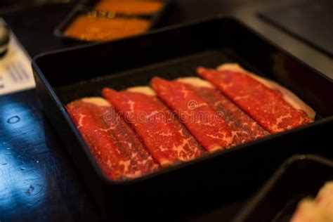 Thinly Sliced Of Raw Pork For Japanese Hot Pot Also Known As Shabu