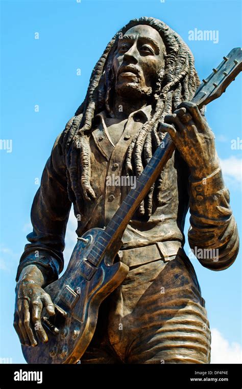 Bob Marley Statue At Night Outside The National Stadium Kingston