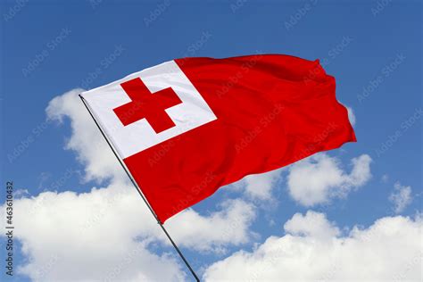 Tonga Flag Isolated On The Blue Sky Background Close Up Waving Flag Of