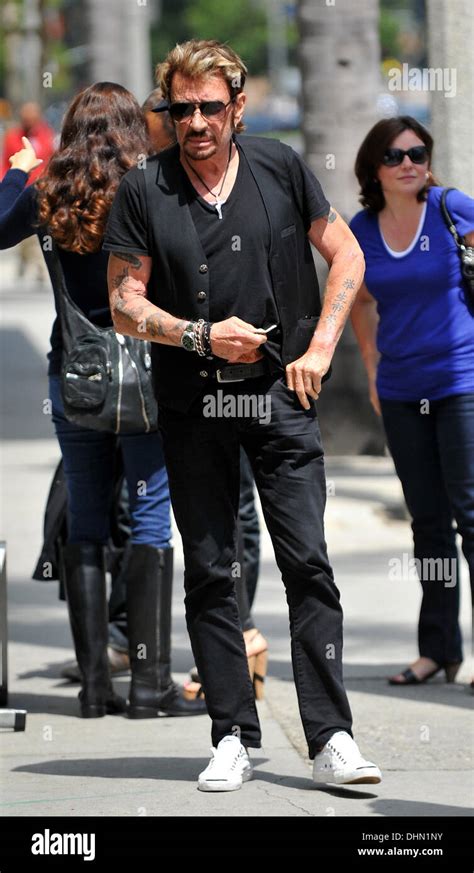 Johnny Hallyday leaving lunch with friends in Brentwood Los Angeles ...