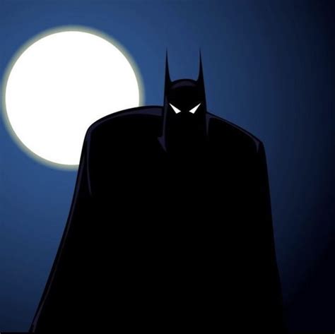 The Silhouette Of Batman Standing In Front Of A Full Moon