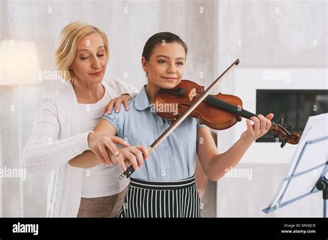 Attentive Blonde Helping Her Follower Stock Photo Alamy