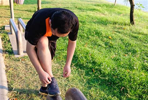 10 Fat Man Tying Shoe Stock Photos Pictures And Royalty Free Images