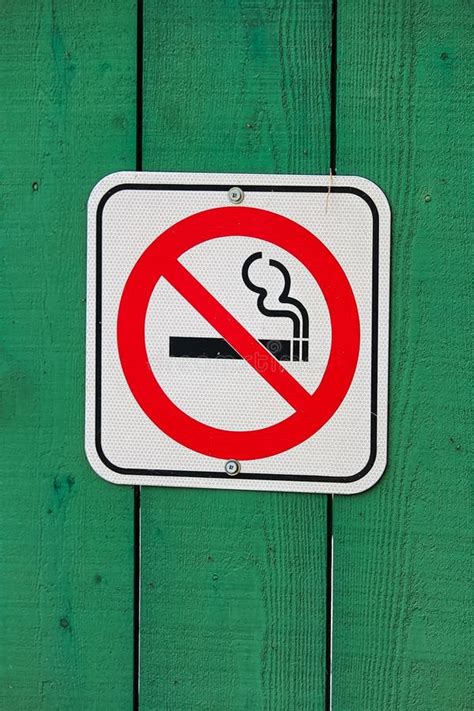 No Smoking Sign On A Green Wooden Background Stock Photo Image Of