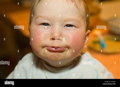 Confident And Tough Baby Boy Makes A Funny Grimace And Rejects His