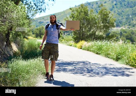 Hitchhiking sign hi-res stock photography and images - Alamy