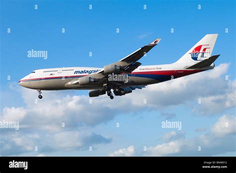 Boeing 747 operated by Malaysia Airlines on approach for landing at London Heathrow Airport, UK ...